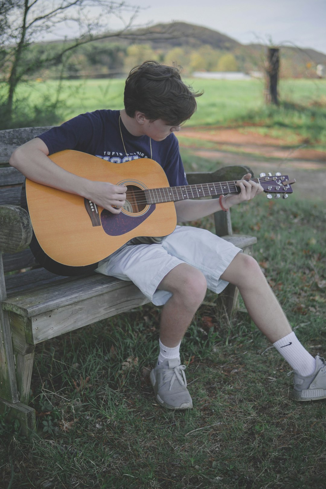 boy plays guitar
